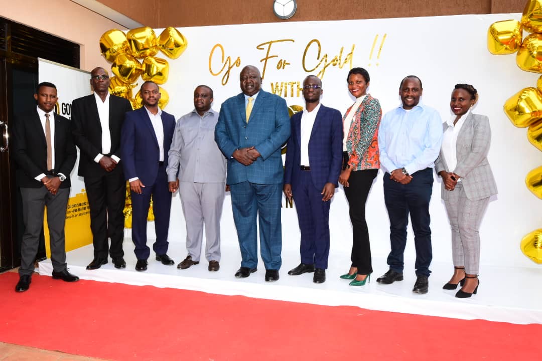 Hon. Henry Okello Oryem, the State Minister for Foreign Affairs (centre), Goldmine Finance’s Managing Director Allan Tayebwa (4th right), Alfred Agaba, the Goldmine Finance Chairman Board of Directors (3rd left) together with regulators, staff and guests at the opening of the financial institution’s second branch in Ntinda.